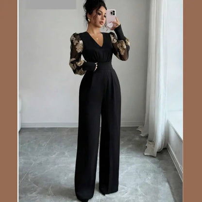Macacão Feminino Preto com Mangas Transparentes Bordadas Shein